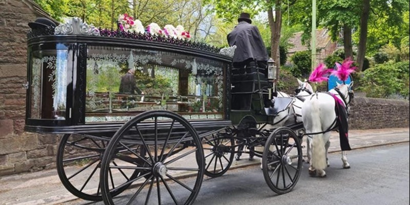 Horse drawn funeral herse